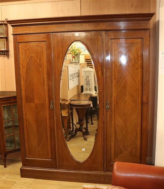 An Edwardian inlaid triple wardrobe W.180cm